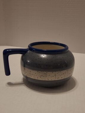 Curling Rock Mug by Main & Local, designed to resemble a granite curling stone